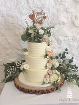 Fresh flowers elegant 3 tier buttercream wedding cake